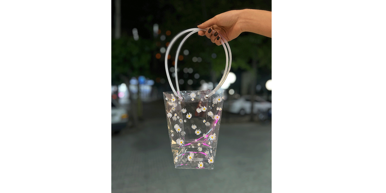 ساک دستی مخروطی طلقی شفاف طرح بابونه